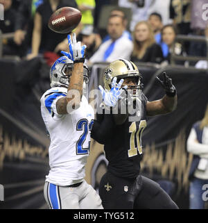 New Orleans Saints wide receiver Brandin Cooks (10) has a Drew Brees pass knocked away by Detroit Lions cornerback Darius Slay (23) during the first quarter at the Mercedes-Benz Superdome in New Orleans December 21, 2015.  Photo by AJ Sisco/UPI Stock Photo