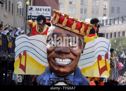 Float riders in the Zulu parade tosses beads to the crowd on St Charles Avenue in New Orleans on Mardi Gras day, Fat Tuesday, February 13, 2018.  Photo by AJ Sisco/UPI Stock Photo