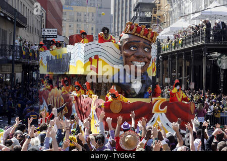 Float riders in the Zulu parade tosses beads to the crowd on St Charles Avenue in New Orleans on Mardi Gras day, Fat Tuesday, February 13, 2018.  Photo by AJ Sisco/UPI Stock Photo