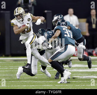 New Orleans Saints wide receiver Tre'Quan Smith (10) slips away from Philadelphia Eagles defenders for a 22 yard gain late in the 2nd quarter at the Mercedes-Benz Superdome in New Orleans November 18, 2018. Photo by AJ Sisco/UPI. Stock Photo