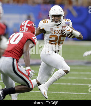 Texas Longhorns Running Back Keaontay Ingram (26) Runs During The NCAA ...