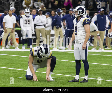 Los Angeles Rams kicker Greg Zuerlein holds the NFC trophy in the locker  room after overtime of the NFL football NFC championship game against the  New Orleans Saints, Sunday, Jan. 20, 2019