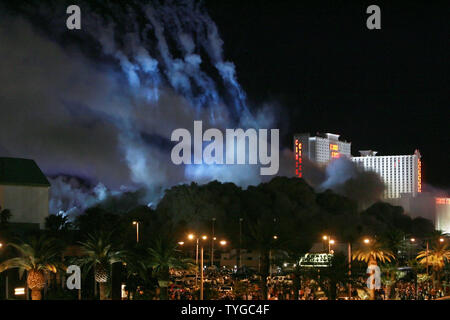 The landmark Stardust Hotel and Casino on the Las Vegas Strip was imploded in the early morning of March 13, 2007.  The Stardust opened in 1958 and was considered Las Vegas' first mass-market casino due to cheap rates, food and drinks.  It came down in a show of fireworks and ended in a cloud of dust.  (UPI Photo/David Allio) Stock Photo