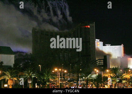 The landmark Stardust Hotel and Casino on the Las Vegas Strip was imploded in the early morning of March 13, 2007.  The Stardust opened in 1958 and was considered Las Vegas' first mass-market casino due to cheap rates, food and drinks.  It came down in a show of fireworks and ended in a cloud of dust.  (UPI Photo/David Allio) Stock Photo