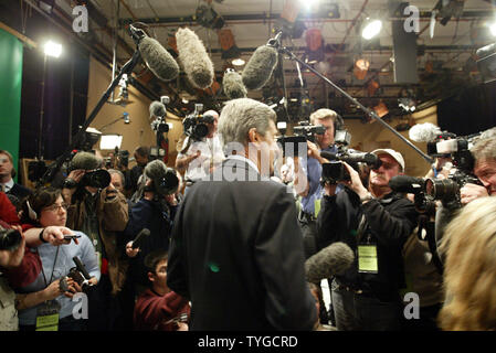 Democratic presidential candidate Sen. John Kerry,meets with reporters following a debate with other democrats at Iowa Public television in Johnston, Iowa , on January 4, 2004. (UPI Photo/Bill Greenblatt) Stock Photo