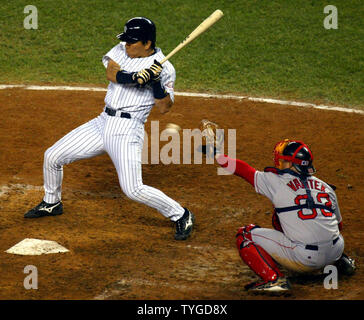 Boston Red Sox's Jason Varitek scores on a fifth-inning, two-run single by  teammate J.D. Drew against the Pittsburgh Pirates in spring training  baseball action at Bradenton, Fla., Wednesday, March 21, 2007. At