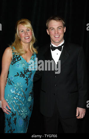 Kevin Harvick and wife DeLana pose for pictures at the 2003 NASCAR Winston Cup Series Awards Ceremony at the Waldorf Astoria Hotel in New York on December 5, 2003.   (UPI Photo/Laura Cavanaugh) Stock Photo