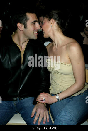 Ashley Judd and husband pose for pictures at the Tuleh Fall 2004 Fashion Shows at Bryant Park in New York on February 8, 2004.   (UPI Photo/Laura Cavanaugh) Stock Photo