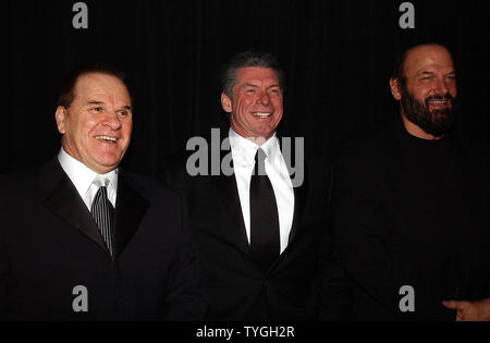 Pete Rose, special inductee, Vincent McMahon, head of the WWE and inductee  former Governor of Minnesota Jesse The Body Ventura (left to right) pose  for the media at the March 13, 2004 World Wrestling Entertainment Hall of  Fame induction