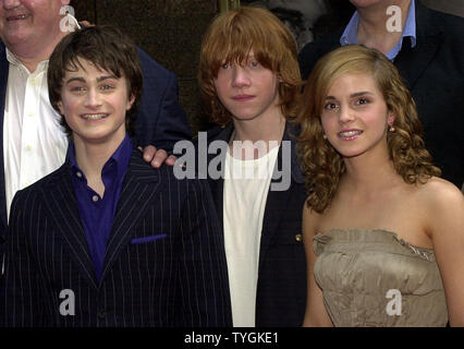 Actors Daniel Radcliffe, Rupert Grint, Emma Watson  pose on May 23, 2004 at the US premiere of their film 'Harry Potter and the Prisoner of Azkaran' at New York's Radio City Music Hall. (UPI Photo/Ezio Petersen) Stock Photo