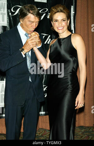 Mariska Hargitay and father Mickey Hargitay pose for pictures at the American Women in Radio & Television Annual Gracie Allen Awards Gala at the Hilton Hotel in New York on June 22, 2004.   (UPI Photo/Laura Cavanaugh) Stock Photo