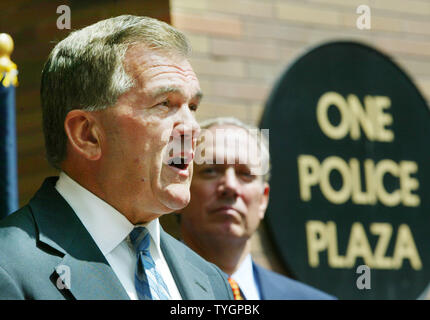 Secretary of Homeland Security Tom Ridge, left, discusses special security measures to be in place during the Republican National Convention as New York State governor George Pataki listens during a press conferance at the New York City Police headquarters August 25, 2004 in New York City.  (UPI Photo/Monika Graff Stock Photo