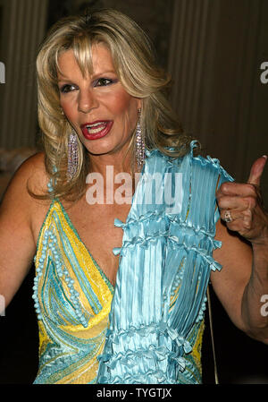 Princess Yasmin Aga Khan poses for pictures at the Alzheimer's Association Rita Hayworth Gala at the Waldorf Astoria Hotel in New York on October 5, 2004.  (UPI Photo/Laura Cavanaugh) Stock Photo