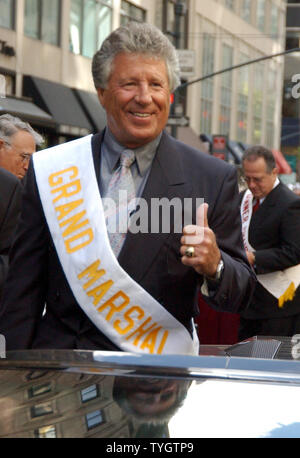 Reknown race car driver Mario Andretti serving as Grand Marshall leads the 60th annual Columbus Day Parade up New York City's 5th Avenue on Oct. 11, 2004 in his Lamborgdini race car. (UPI Photo/Ezio Petersen) Stock Photo