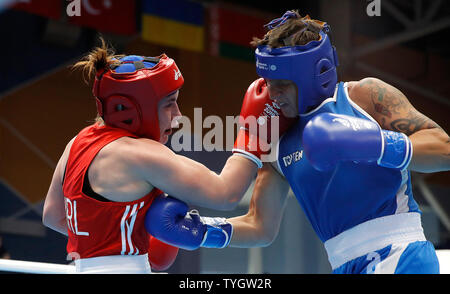 Ireland's Grainne Walsh (left) on her way to winning her Women's Welterweight Boxing Quarter Final against Finland's Elina Gustafsson, during day six of the European Games 2019 in Minsk. Stock Photo