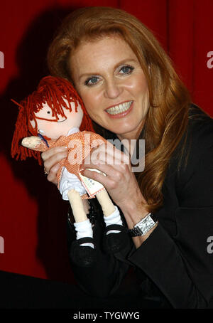The Duchess of York, Sarah Ferguson, shows the media her Little Red