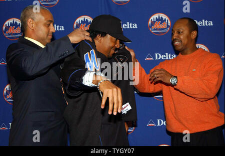 Former Boston Red Sox pitcher Pedro Martinez jousts with the media at Shea  Stadium during a 12/16/04 press conference where he offically joined the  New York Mets baseball team. (UPI Photo/Ezio Petersen