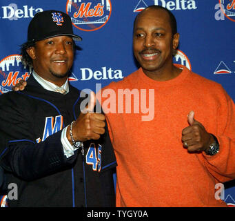 Former Boston Red Sox pitcher Pedro Martinez jousts with the media at Shea  Stadium during a 12/16/04 press conference where he offically joined the  New York Mets baseball team. (UPI Photo/Ezio Petersen