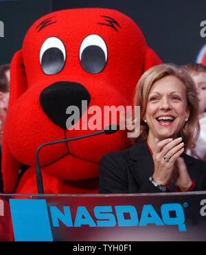 Deborah Forte, President of Scholastic Entertainment is joined by their  most famous book characther Clifford The Big Red Dog at the 2/14/05  ceremonial NASDAQ opening bell ring for trading in New York. (