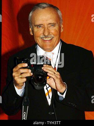 Actor Dennis Hopper, who stars in the new NBC tv series 'E Ring' looks for other stars to photograph while attending the 2005 NBC tv Upfronts held in New York on May 16, 2005 at Radio City Music Hall.  (UPI Photo/Ezio Petersen) Stock Photo