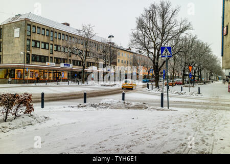 Storgatan, the main street in the Swedish town of Tranas, in winter. Tranas, Smaland, Sweden. January 2019. Stock Photo