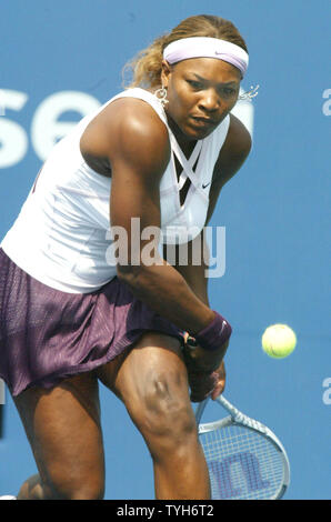 Serena Williams, who is eighth seeded, wears elegant earrings as she returns the ball to  Yung-Jan Chan of Chinese Taipei during their game at the US Open held at the National Tennis Center on August 29, 2005. Williams went on to win 6-1, 6-3.  (UPI Photo/Monika Graf) Stock Photo