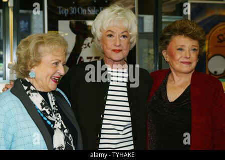 Betty White, left, Bea Arthur and Rue McClanahan of the TV sit-com 'The Golden Girls' are on hand to sign copies of the show's new DVD of their third season at a book store on November 22, 2005 in New York City. (UPI Photo/Monika Graff) Stock Photo