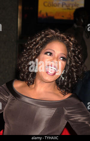 TV talk show host Oprah Winfrey arrives at the Broadway theatre on December 1, 2005 for the opening night performance of the Broadway musical 'The Color Purple' Ms. Winfrey starred in the 80's film verison of Alice Walker book and is the primary producer of the Broadway musical. (UPI Photo/D.Van) Stock Photo