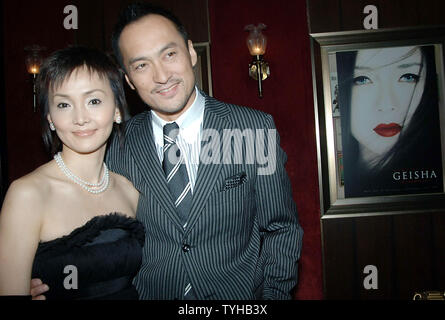 Actor Ken Watanabe and his wife pose at the December 6, 2005 New York ...