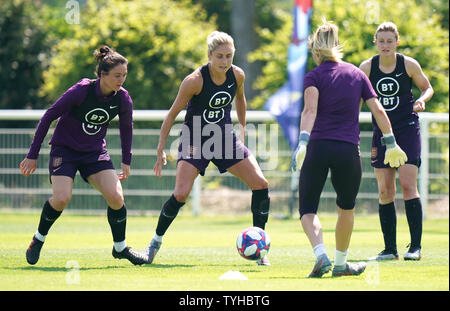 England's Steph Houghton (centre) during the training session at Stade Parc des Loisirs, Le Havre, France. Stock Photo