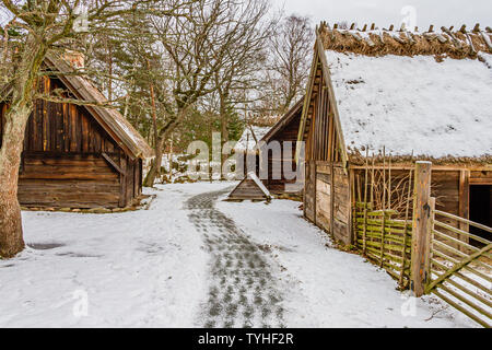 Traditional Swedish farm buildings in Skansen open-air museum, Stockholm, Sweden. January 2019. Stock Photo