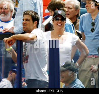 Jennifer Capriati smiles while wearing aNew York Mets hat at Shea Stadium  in New York City on May 20, 2006. The New York Mets host the New York  Yankees. (UPI Photo/John Angelillo