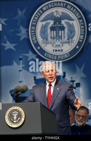 President George W. Bush raises his hand while he speaks during graduation day at the United States Merchant Marine Academy in Kings Point, NY on June 19, 2006.  (UPI Photo/John Angelillo) Stock Photo