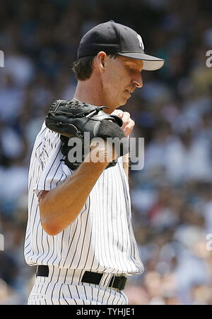 New York Yankees pitcher Randy Johnson closes his eyes in the 5th inning at Yankees Stadium in New York City on July 19, 2006. The Seattle Mariners defeated the New York yankees 3-2.  (UPI Photo/John Angelillo) Stock Photo