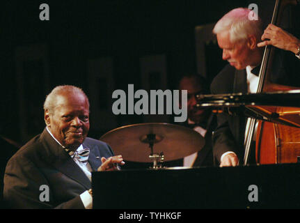 Legendary Jazz pianist Oscar Peterson performs in New York at the Birdland Jazz club with David Young (bass) on August 22, 2006. (UPI Photo/Ezio Petersen) Stock Photo