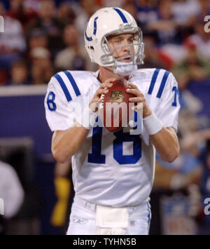 Indianapolis Colts QB Peyton Manning (18) drops back to pass