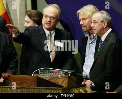 Marsh Carter, left, chairman of the New York Stock Exchange, talks with Sir Richard Branson, founder of Virgin and ambassador to ORBIS, and James Parker, right, senior vice president of Air Operations at FedEx, after the opening bell ceremony at the New York Stock Exchange as they celebrate the 25th anniversary of ORBIS International at the exchange on March 2, 2007 in New York City. ORBIS International, which is sponsored by FedEx, provides eye care to 85 countries including Ethiopia where last year 425,000 people were treated.   (UPI Photo/Monika Graff) Stock Photo