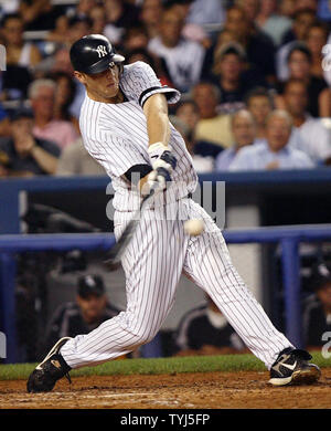 Tampa Bay Devil Rays Akinori Iwamura connect with the baseball in the first  inning against the New York Yankees at Yankee Stadium in New York City on  July 22, 2007. (UPI Photo/John