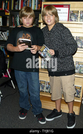 Dylan (L) and Cole Sprouse pose for pictures before signing  copies of their new book 'Sprouse Bros. 47 R.O.N.I.N.: The Showdown and The Revelation' at Borders in  New York on September 19, 2007.  (UPI Photo/Laura Cavanaugh) Stock Photo