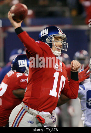 New York Giants quarterback Eli Manning releases a pass in the second  quarter against the Dallas Cowboys at Giants Stadium in East Rutherford,  New Jersey on November 11, 2007. (UPI Photo/John Angelillo