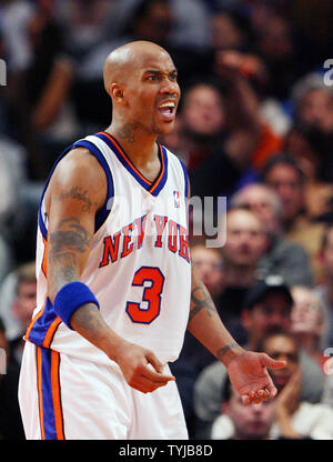 Phoenix Suns' Stephon Marbury reacts to scoring over New Jersey Nets' Jason  Kidd during the final seconds of the game Wednesday, Nov. 27, 2002, in  Phoenix. The Suns defeated the Nets 82-75. (