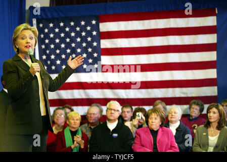 Sen. Hillary Clinton (D-NY), speaks at the United Methodist Church, as her mother Dorothy Rodham (2nd R) and Mary Steenburgen (R) look on, while campaigning for the Iowa Caucus in Indianola, Iowa on January 2, 2008. (UPI Photo/Laura Cavanaugh) Stock Photo