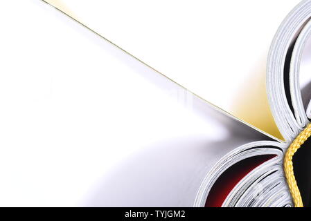 Macro view of book pages isolated on white background Stock Photo