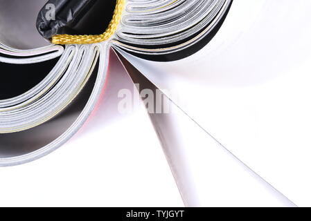 Macro view of book pages isolated on white background Stock Photo