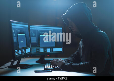hacker with progress loading bar on computers Stock Photo
