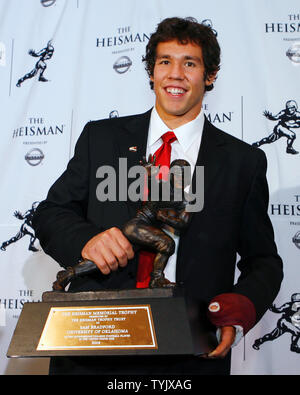 Sam Bradford of the University of Oklahoma holds up the Heisman Trophy at the Sports Museum of America in New York City on December 13, 2008.                                        (UPI Photo/John Angelillo)   . Stock Photo