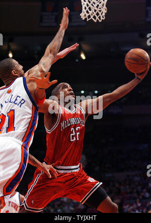 Milwaukee Bucks Michael Redd (22) stretches out under the basket against the New York Knicks at Madison Square Garden in New York City on December 19, 2008.     (UPI Photo/John Angelillo) Stock Photo