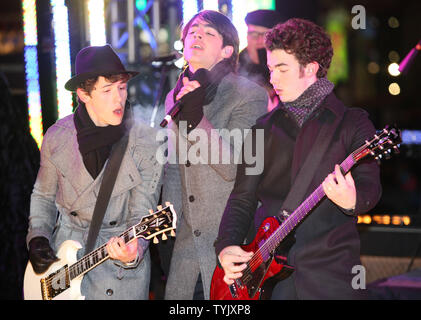The Jonas Brothers perform during the Times Square New Year's Eve