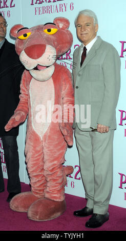 Actor Steve Martin greets the Pink Panther while attending  the New York premiere of their  film 'The Pink Panther 2' at the Ziegfeld Theatre on February 3, 2009.    (UPI Photo/Ezio Petersen) Stock Photo