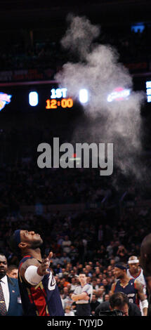Cleveland Cavaliers LeBron James throws chalk in the air before playing the New York Knicks at Madison Square Garden in New York City on February 4, 2009. The Cavaliers defeated the Knicks 107-102.     (UPI Photo/John Angelillo) Stock Photo